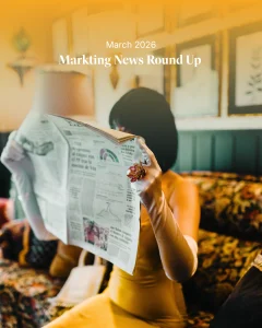 Person in a yellow outfit and white gloves reading a newspaper on a patterned sofa in a warmly lit room, with the text “March 2026,” representing a weekly news round-up.